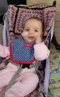 Angelique-dec13-loves her Frazer Chair